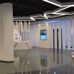 企业展厅设计方案中的产品展示区如何有效与多媒体技术结合